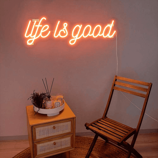 life is good neon sign on the wall